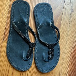Black leather embellished sandals